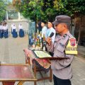 Bhabinkamtibmas Polsek Kembang Jadi Pembina Upacara di MTs KRM Marzuki